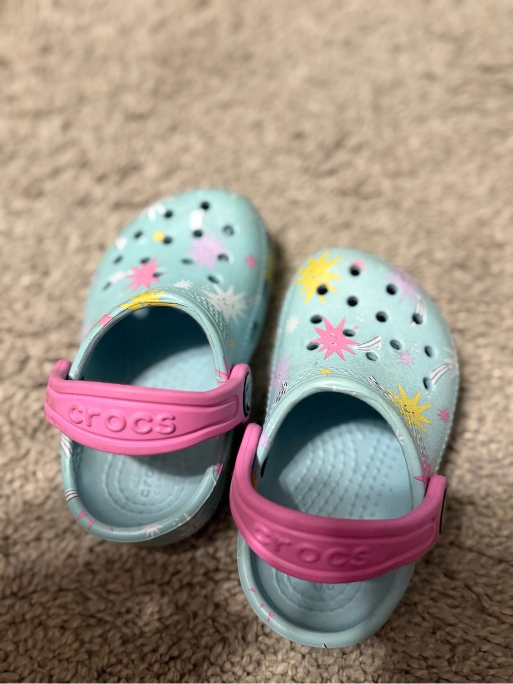 CROCS Light Blue Clog Sandals with Pink Heel Strap and Starburst Print